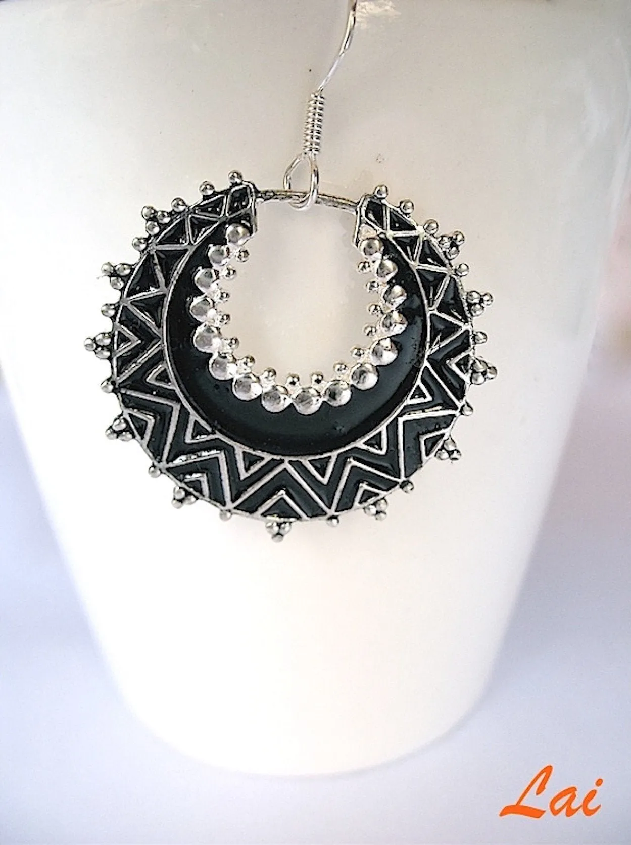 Exquisite, crescent shape, dangle earrings with fine black enamel work
