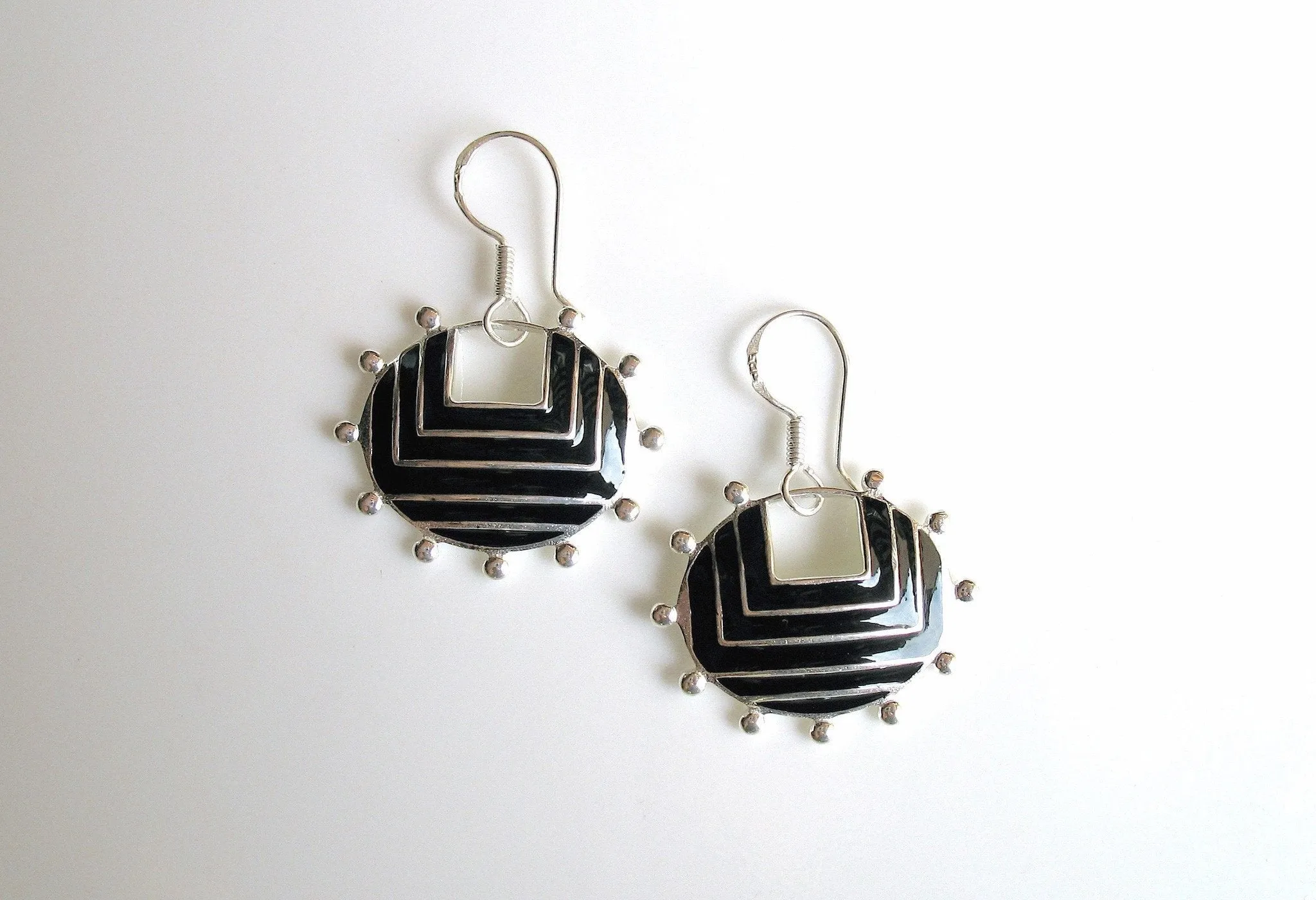 Graphic, chic, oval earrings with fine black enamel and granulation work