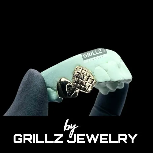 Grillz 2pc small fangs diamond dust and cut