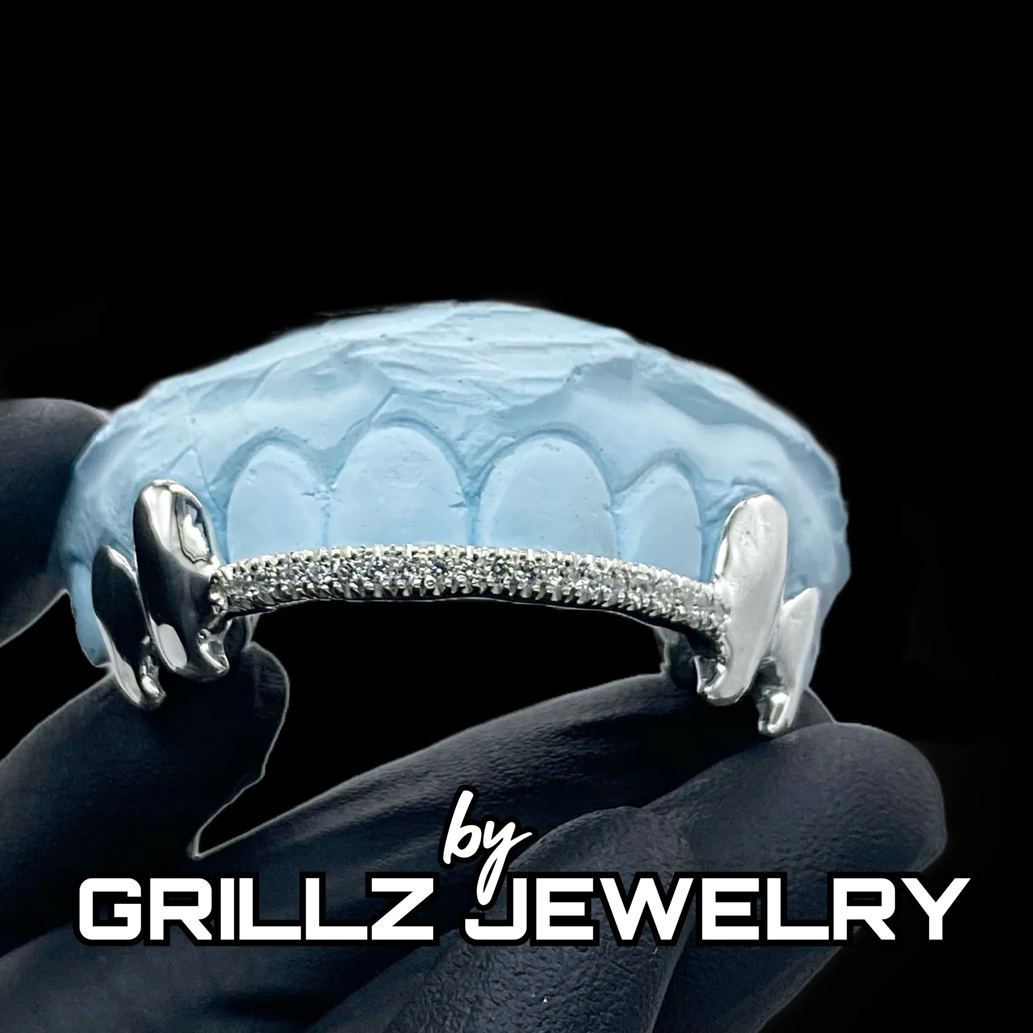 Grillz double king crab fangs with diamond bar